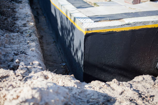 Professional Waterproofing technician working in Mooreland, IN